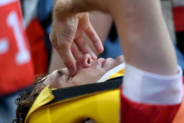Mario Fernandes of Russia reacts as he is stretchered off after suffering an injury during the UEFA Euro 2020 Championship Group B match between...