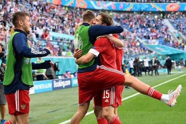 Aleksei Miranchuk of Russia celebrates with team mates after scoring their side's first goal during the UEFA Euro 2020 Championship Group B match...