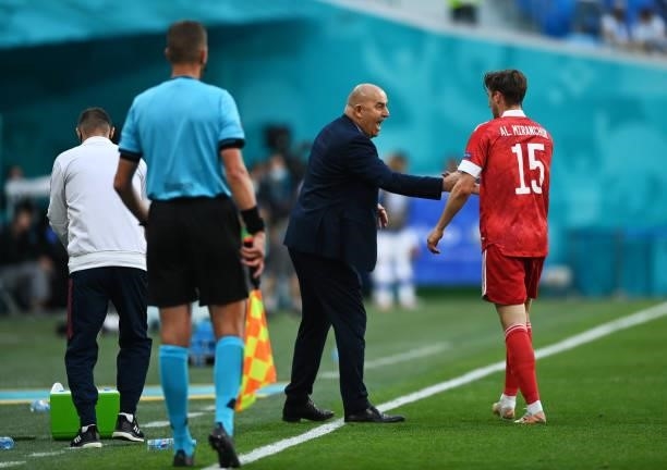 Stanislav Cherchesov, Head Coach of Russia congratulates Aleksei Miranchuk of Russia after he scored their side's first goal during the UEFA Euro...