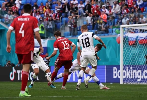 Aleksei Miranchuk of Russia scores their side's first goal during the UEFA Euro 2020 Championship Group B match between Finland and Russia at Saint...