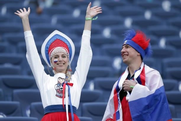 Fans of Russia pose for a photograph during the UEFA Euro 2020 Championship Group B match between Finland and Russia at Saint Petersburg Stadium on...