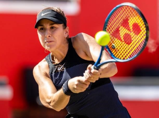 Belinda Bencic of Switzerland hits a backhand against Petra Martic of Croatia in the women's singles second round match during day 5 of the bett1open...