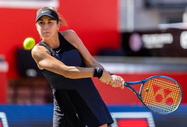 Belinda Bencic of Switzerland hits a backhand against Petra Martic of Croatia in the women's singles second round match during day 5 of the bett1open...