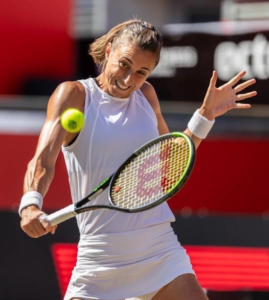 Petra Martic of Croatia hits a backhand against Belinda Bencic of Switzerland in the women's singles second round match during day 5 of the bett1open...