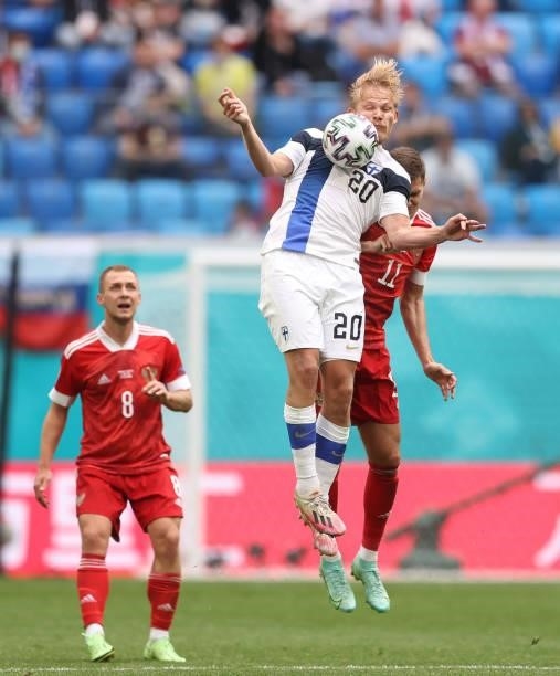 Joel Pohjanpalo of Finland is closed down by Roman Zobnin of Russia during the UEFA Euro 2020 Championship Group B match between Finland and Russia...