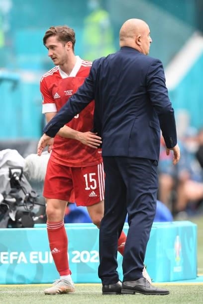 Aleksei Miranchuk of Russia interacts with Stanislav Cherchesov, Head Coach of Russia after being substituted during the UEFA Euro 2020 Championship...