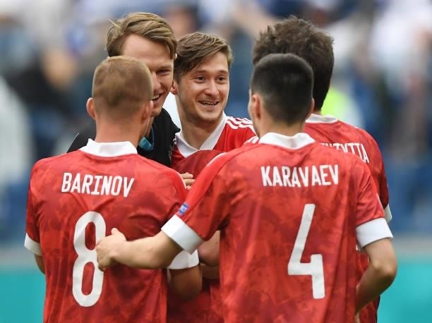 Aleksei Miranchuk of Russia celebrates with team mates after victory in the UEFA Euro 2020 Championship Group B match between Finland and Russia at...