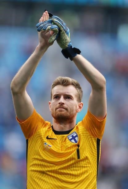 Lukas Hradecky of Finland applauds the fans following defeat in the UEFA Euro 2020 Championship Group B match between Finland and Russia at Saint...