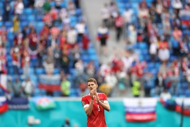 Igor Diveev of Russia applauds the fans following victory in the UEFA Euro 2020 Championship Group B match between Finland and Russia at Saint...