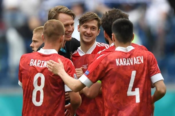 Aleksei Miranchuk of Russia celebrates their side's victory with team mates after the UEFA Euro 2020 Championship Group B match between Finland and...