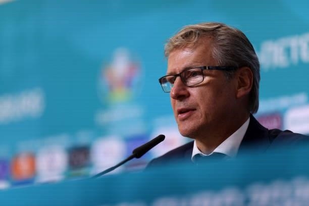In this Handout picture provided by UEFA, Markku Kanerva, Head Coach of Finland speaks to the media during the Finland Press Conference after the...