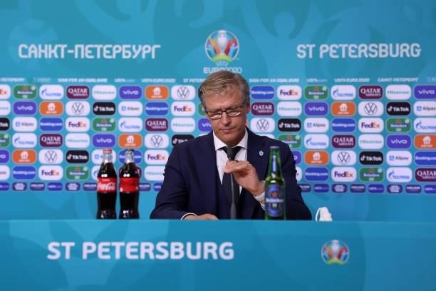 In this Handout picture provided by UEFA, Markku Kanerva, Head Coach of Finland speaks to the media during the Finland Press Conference after the...