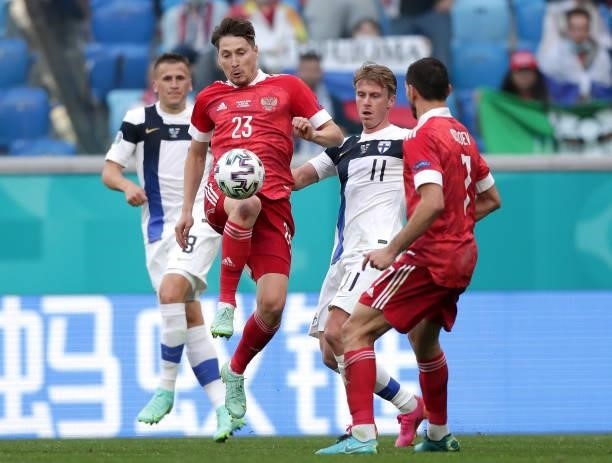 Daler Kuzyaev of Russia is closed down by Rasmus Schueller of Finland during the UEFA Euro 2020 Championship Group B match between Finland and Russia...