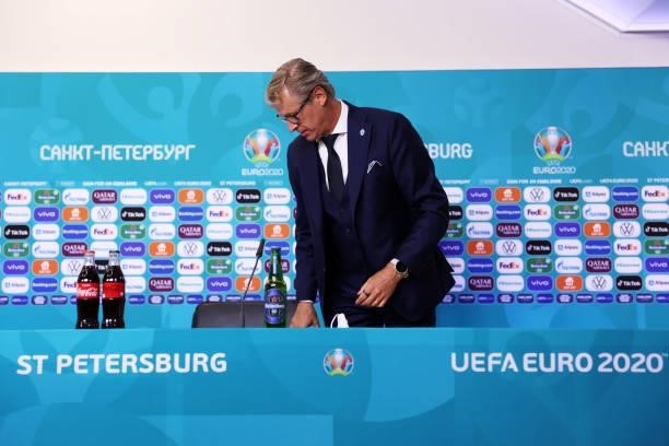 In this Handout picture provided by UEFA, Markku Kanerva, Head Coach of Finland prepares to speak to the media during the Finland Press Conference...
