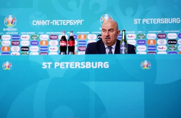 In this Handout picture provided by UEFA, Stanislav Cherchesov, Head Coach of Russia speaks to the media during the Russia Press Conference after the...