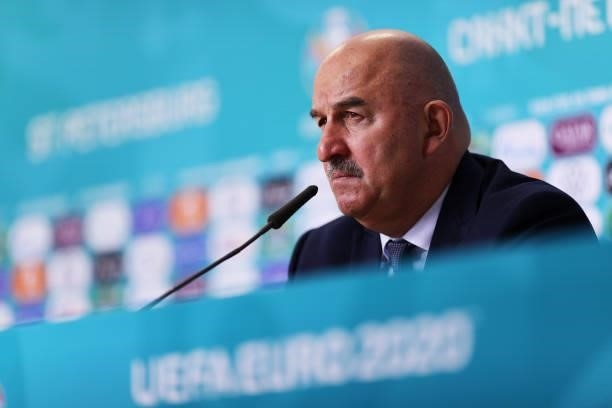 In this Handout picture provided by UEFA, Stanislav Cherchesov, Head Coach of Russia speaks to the media during the Russia Press Conference after the...