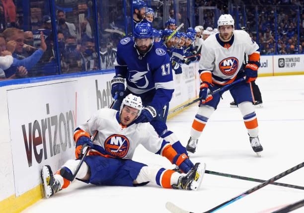 Mathew Barzal of the New York Islanders is checked by Alex Killorn of the Tampa Bay Lightning in Game Two of the Stanley Cup Semifinals during the...