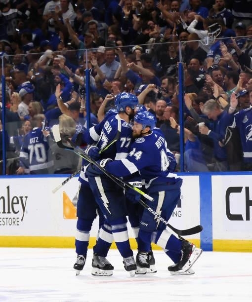 Jan Rutta of the Tampa Bay Lightning celebrates with his teammates after scoring a goal on Semyon Varlamov of the New York Islanders during the third...