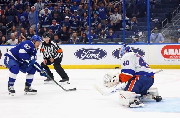 Semyon Varlamov of the New York Islanders makes the breakaway save on Yanni Gourde of the Tampa Bay Lightning in Game Two of the Stanley Cup...