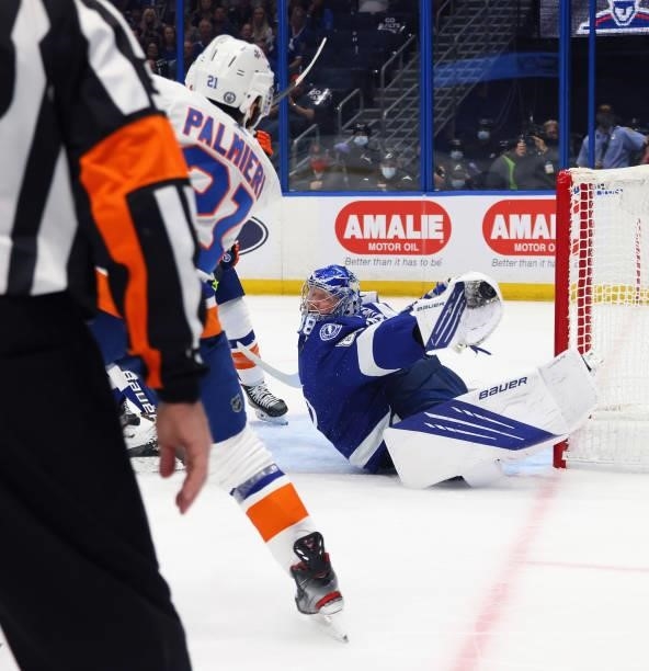 Andrei Vasilevskiy of the Tampa Bay Lightning makes a glove save against Kyle Palmieri of the New York Islanders during the first period in Game Two...