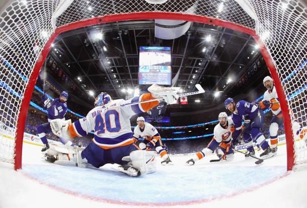 Semyon Varlamov of the New York Islanders defends the net against the Tampa Bay Lightning in Game Two of the Stanley Cup Semifinals during the 2021...