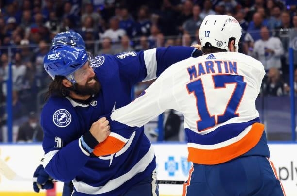 Matt Martin of the New York Islanders and Pat Maroon of the Tampa Bay Lightning fight in Game Two of the Stanley Cup Semifinals during the 2021...