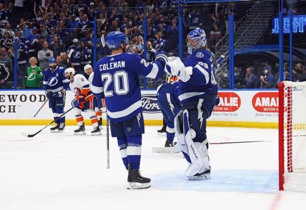 Blake Coleman and Andrei Vasilevskiy of the Tampa Bay Lightning celebrate their win over the New York Islanders in Game Two of the Stanley Cup...