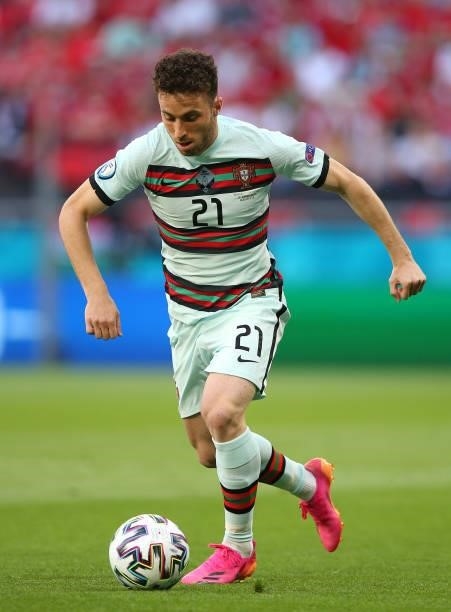 Diogo Jota of Portugal runs with the ball during the UEFA Euro 2020 Championship Group F match between Hungary and Portugal on June 15, 2021 in...