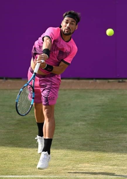 Fabio Fognini of Italy serves during his Round of 16 match against Marin Čilić of Croatia during Day 3 of The cinch Championships at The Queen's Club...