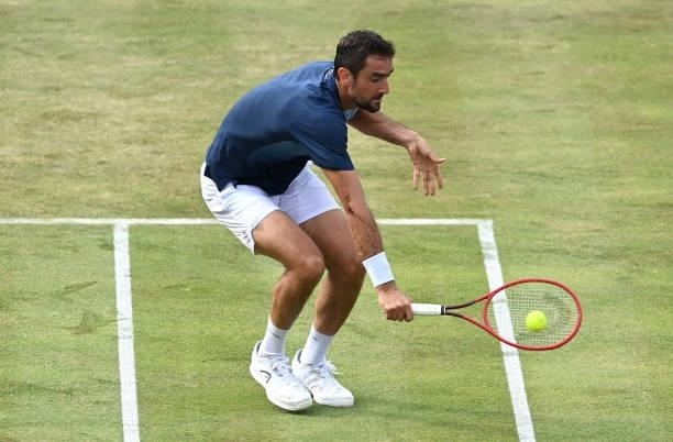 Marin Čilić of Croatia plays a backhand during his Round of 16 match against Fabio Fognini of Italy during Day 3 of The cinch Championships at The...
