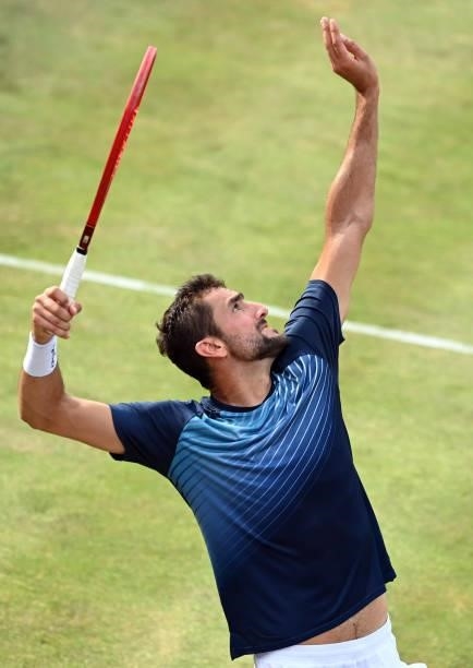 Marin Čilić of Croatia serves during his Round of 16 match against Fabio Fognini of Italy during Day 3 of The cinch Championships at The Queen's Club...