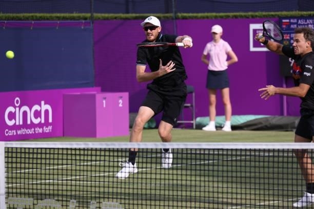 Jamie Murray of Great Britain, playing partner of Bruno Soares of Brazil plays a forehand during there Round of 16 match against Aslan Karatsev of...