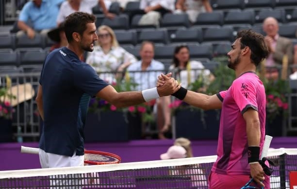 Marin Čilić of Croatia and Fabio Fognini of Italy congratulate each other after there Round of 16 match during Day 3 of The cinch Championships at...