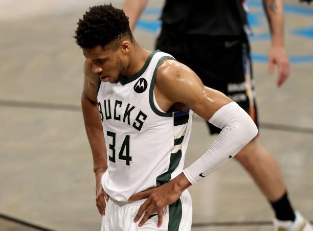 Giannis Antetokounmpo of the Milwaukee Bucks reacts in the fourth quarter against the Brooklyn Nets during game 5 of the Eastern Conference second...