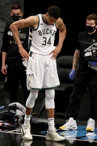 Giannis Antetokounmpo of the Milwaukee Bucks reacts as he is on the bench after his sixth foul against the Brooklyn Nets during game 5 of the Eastern...