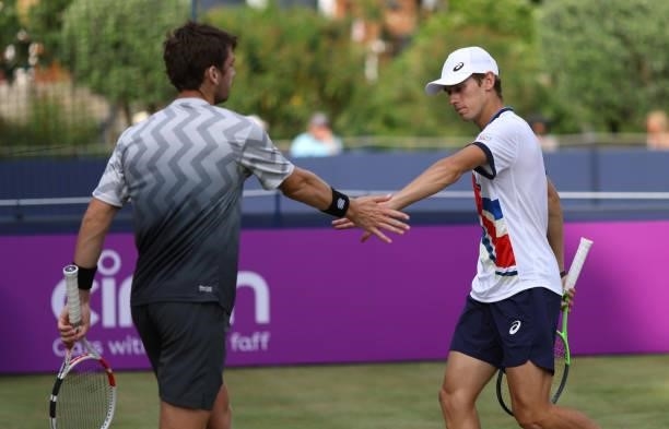 Cameron Norrie of Great Britain and Alex de Minaur of Australia interact during there Round of 16 match against Rajeev Ram of USA and Joe Salisbury...