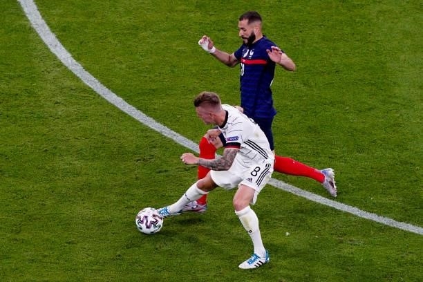 Toni Kroos of Germany, Karim Benzema of France during the UEFA Euro 2020 match between France and Germany at Allianz Arena on June 15, 2021 in...