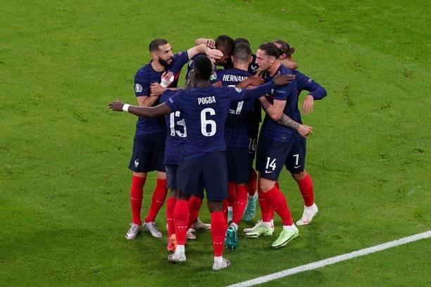 Paul Pogba of France celebrating with his teammates during the UEFA Euro 2020 match between France and Germany at Allianz Arena on June 15, 2021 in...
