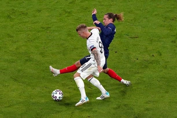 Toni Kroos of Germany, Antoine Griezmann of France during the UEFA Euro 2020 match between France and Germany at Allianz Arena on June 15, 2021 in...