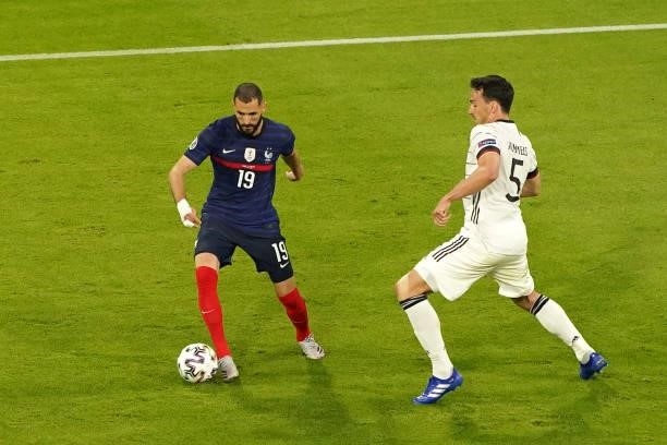 Karim Benzema of France, Mats Hummels of Germany during the UEFA Euro 2020 match between France and Germany at Allianz Arena on June 15, 2021 in...