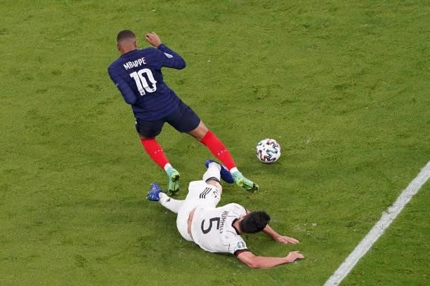 Kylian Mbappe of France, Mats Hummels of Germany during the UEFA Euro 2020 match between France and Germany at Allianz Arena on June 15, 2021 in...