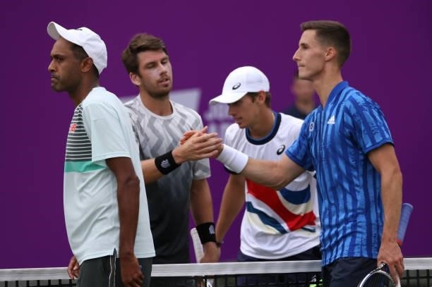 Cameron Norrie of Great Britain and Alex de Minaur of Australia congratulate Rajeev Ram of USA and Joe Salisbury of Great Britain during there Round...