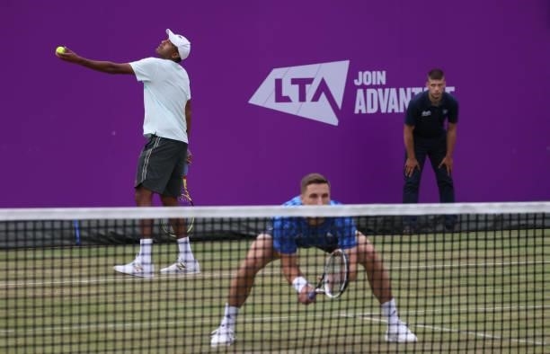 Rajeev Ram of USA, playing partner of Joe Salisbury of Great Britain serves during there Round of 16 match against Alex de Minaur of Australia and...