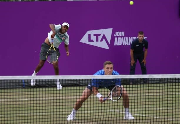 Rajeev Ram of USA, playing partner of Joe Salisbury of Great Britain serves during there Round of 16 match against Alex de Minaur of Australia and...