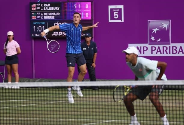 Joe Salisbury of Great Britain, playing partner of Rajeev Ram of USA plays a backhand during there Round of 16 match against Alex de Minaur of...