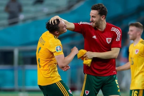 Ben Davies of Wales and Tom Lockyer of Wales celebrate after winning their match against Turkey during the UEFA Euro 2020 Championship Group A match...