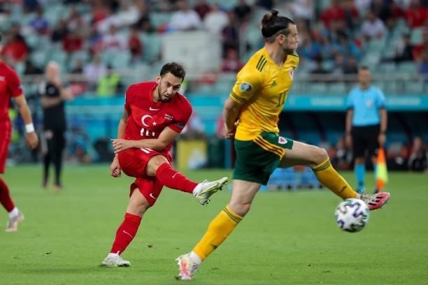 Hakan Calhanoglu of Turkey has a shot at goal during the UEFA Euro 2020 Championship Group A match between Turkey National Team and Wales National...