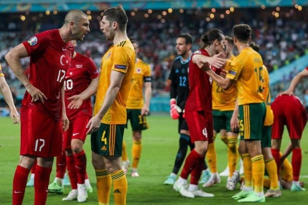 Both teams' players clash during the UEFA Euro 2020 Championship Group A match between Turkey and Wales at Baku Olympic Stadium on June 16, 2021 in...