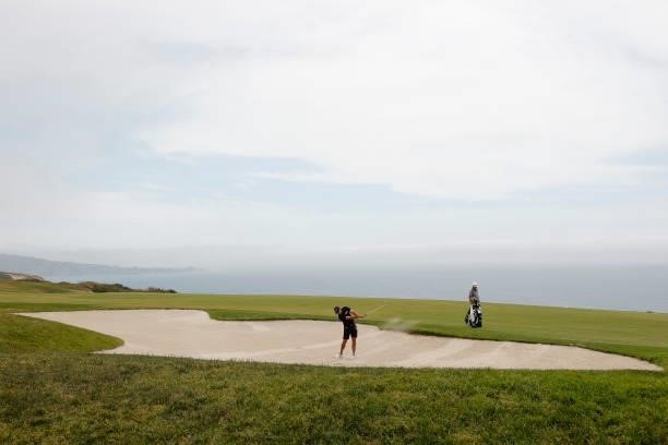 Charl Schwartzel of South Africa plays a shot from a bunker on the fourth hole during a practice round prior to the start of the 2021 U.S. Open at...