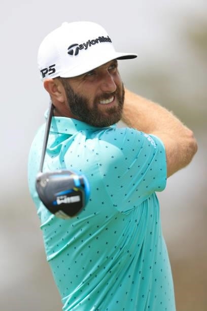 Dustin Johnson of the United States hits a tee shot during a practice round prior to the start of the 2021 U.S. Open at Torrey Pines Golf Course on...